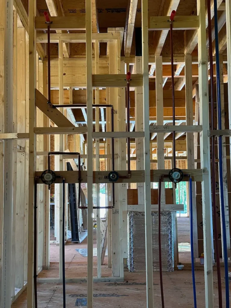 shower pipes inside new construction